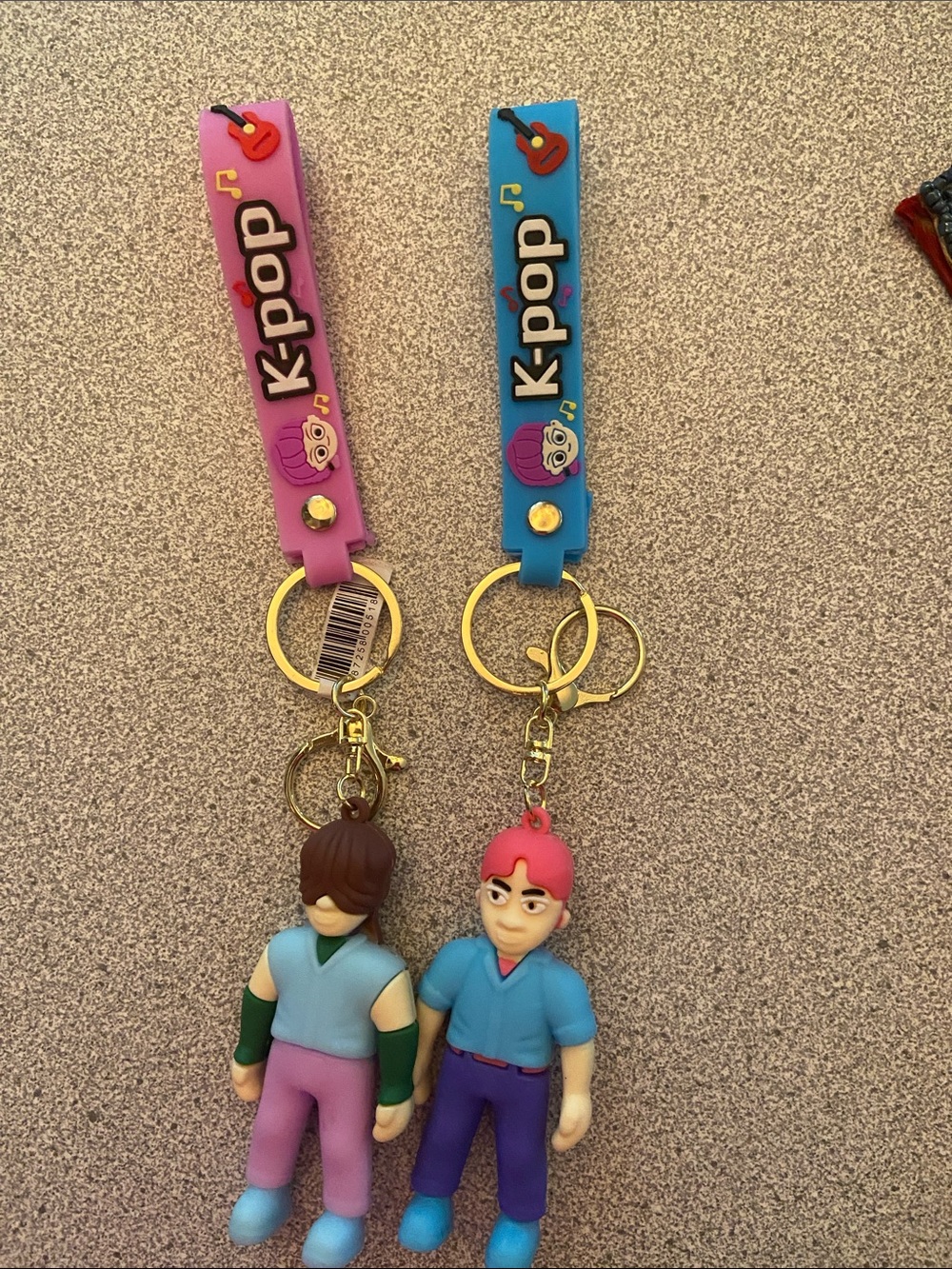 pop K-Pop Character Keychain Pair — Pink & Blue Straps with Gold Hardware